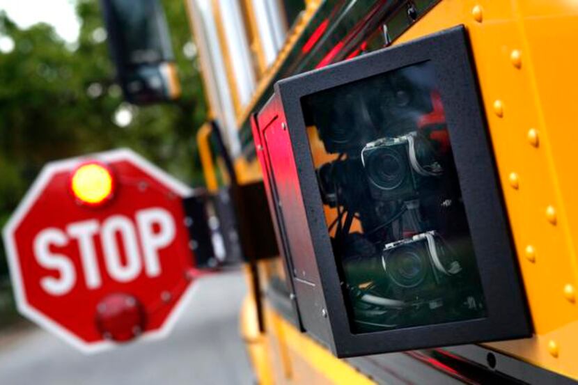 Cameras mounted on the outside of a Dallas County Schools bus can catch drivers who fail to...