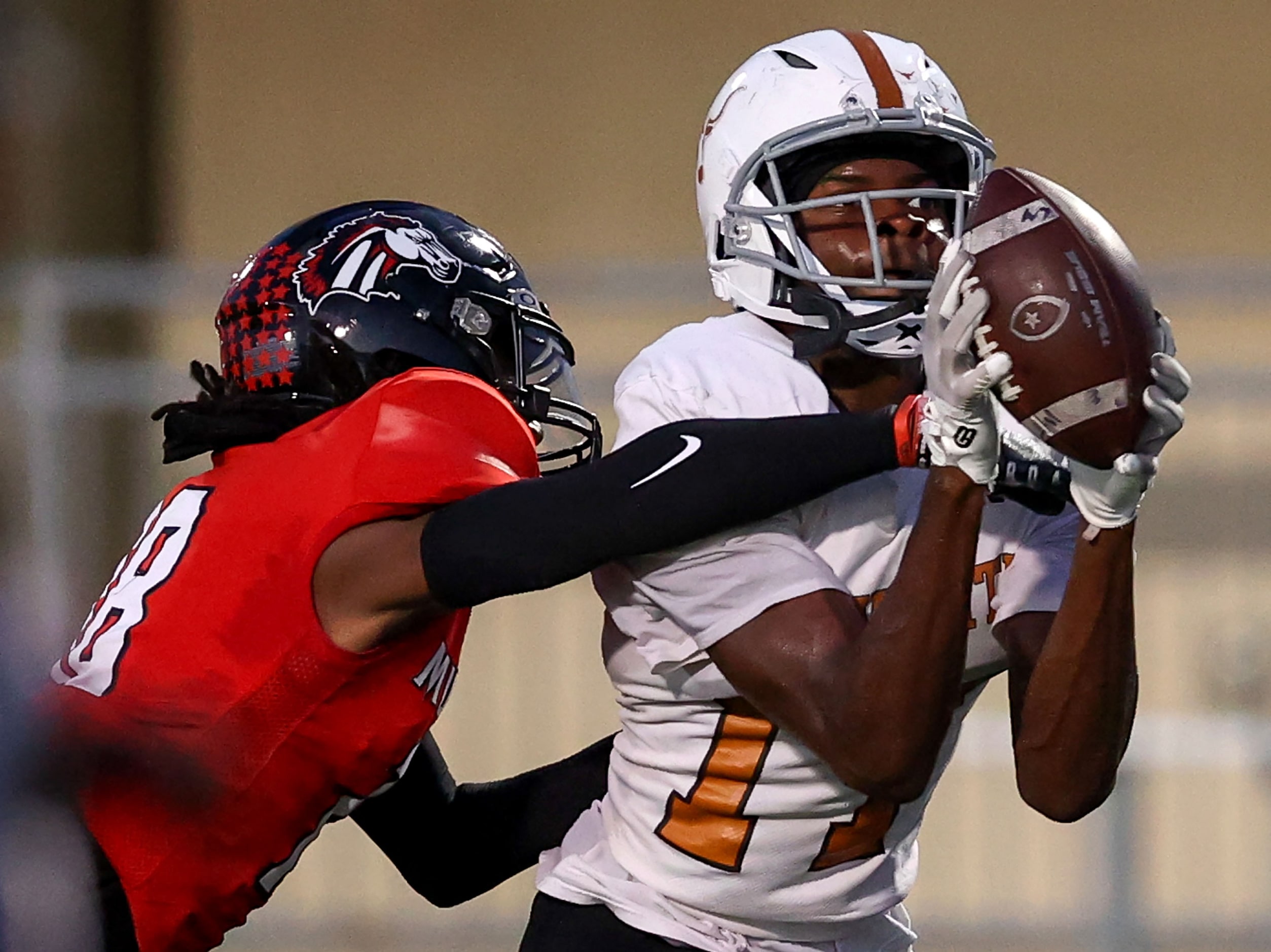 W.T. White wide receiver Ambrose Carter (17) makes a great reception for a touchdown against...