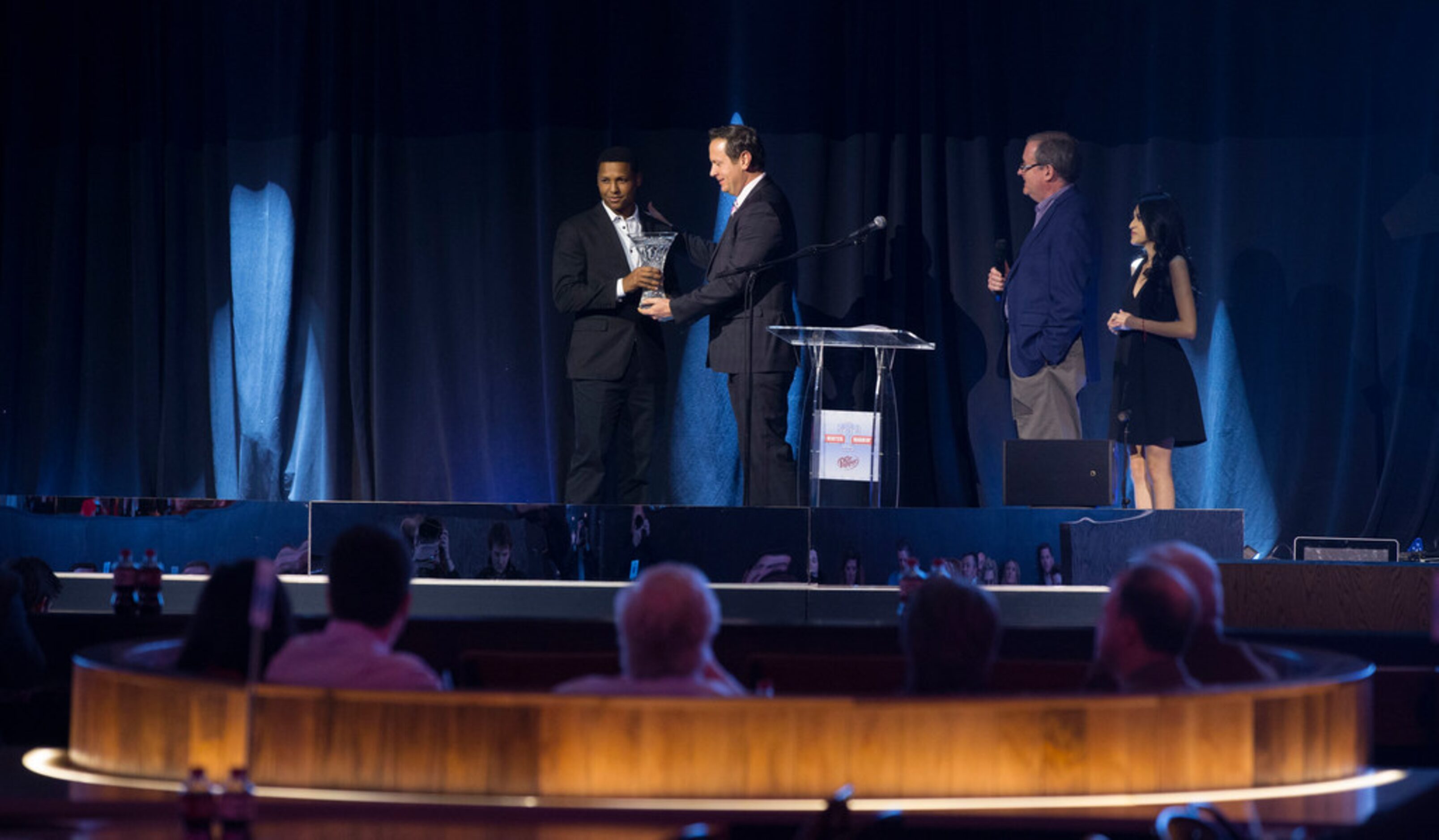 From left, Ranger pitcher JosÅ½ Leclerc is presented with the 2018 Texas Rangers Pitcher of...