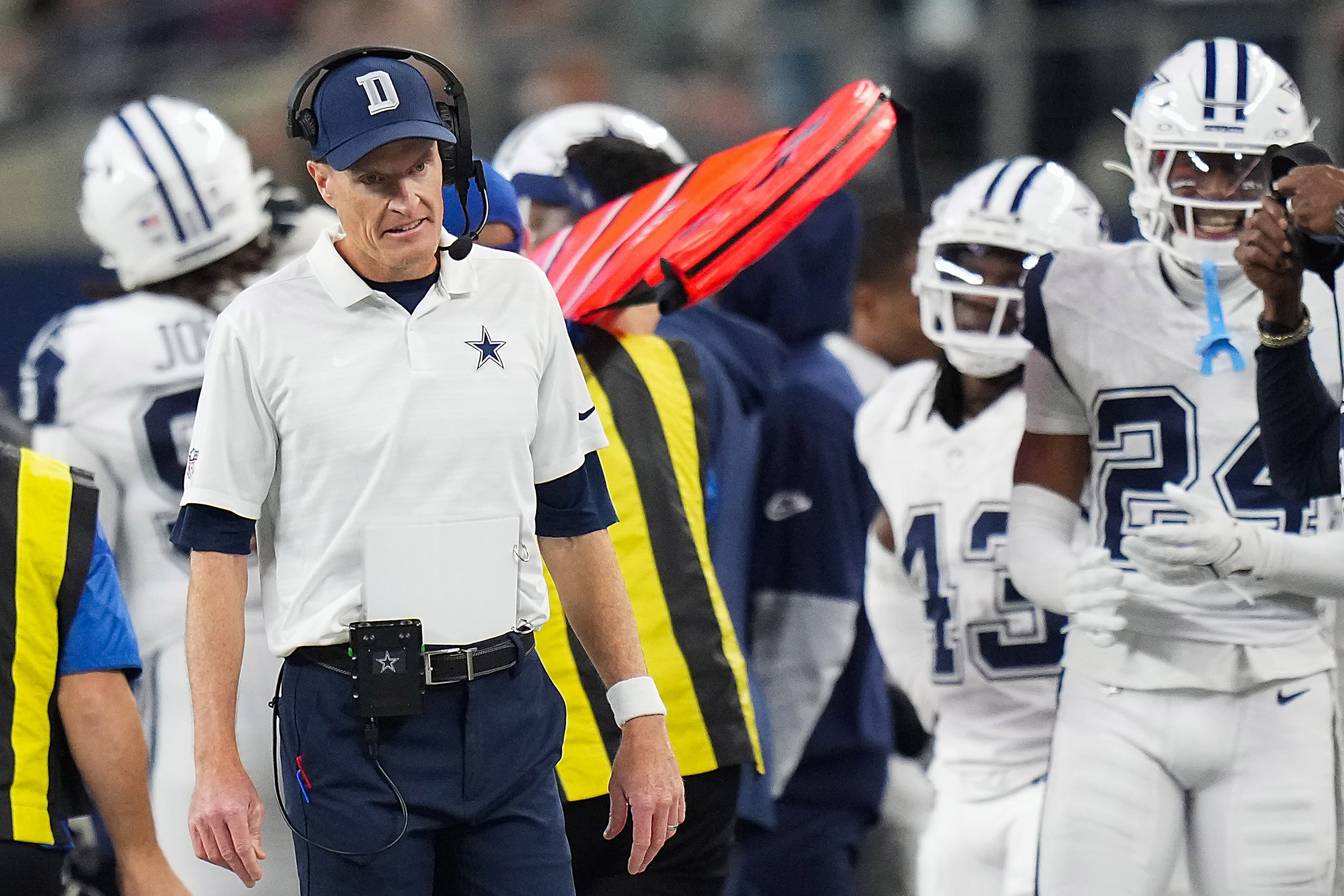 Dallas Cowboys special teams coordinator John Fassel reacts after a muffed punt return...