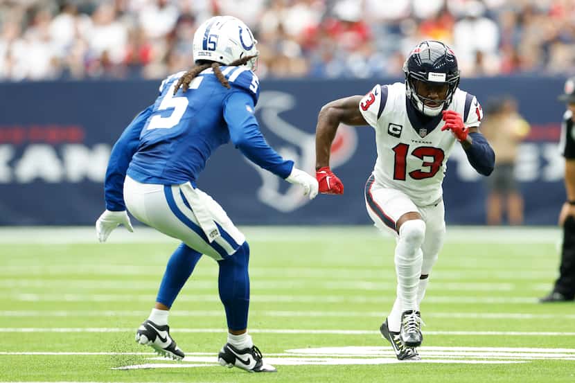 Houston Texans wide receiver Brandin Cooks (13) runs a pass route against Stephon Gilmore...