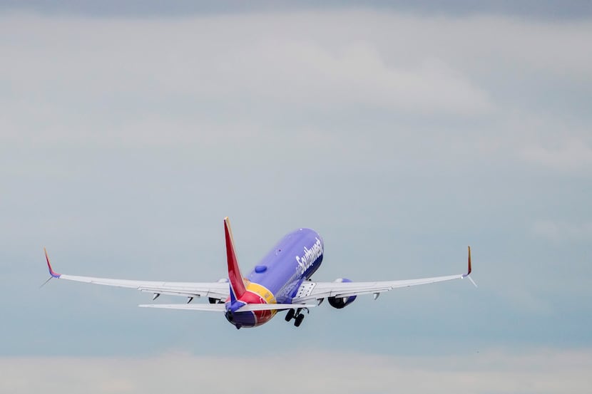 A Southwest Airlines Boeing 737-800 takes off at Love Field on Wednesday, Sept. 23, 2020, in...