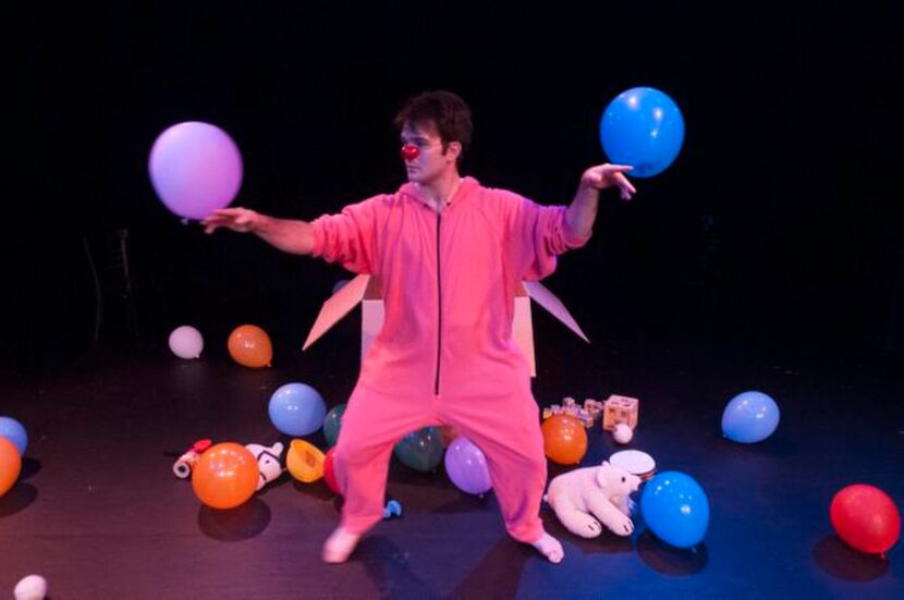 
Jeff Colangelo performs a scene from "Playtime" at the Bath House Cultural Center on...