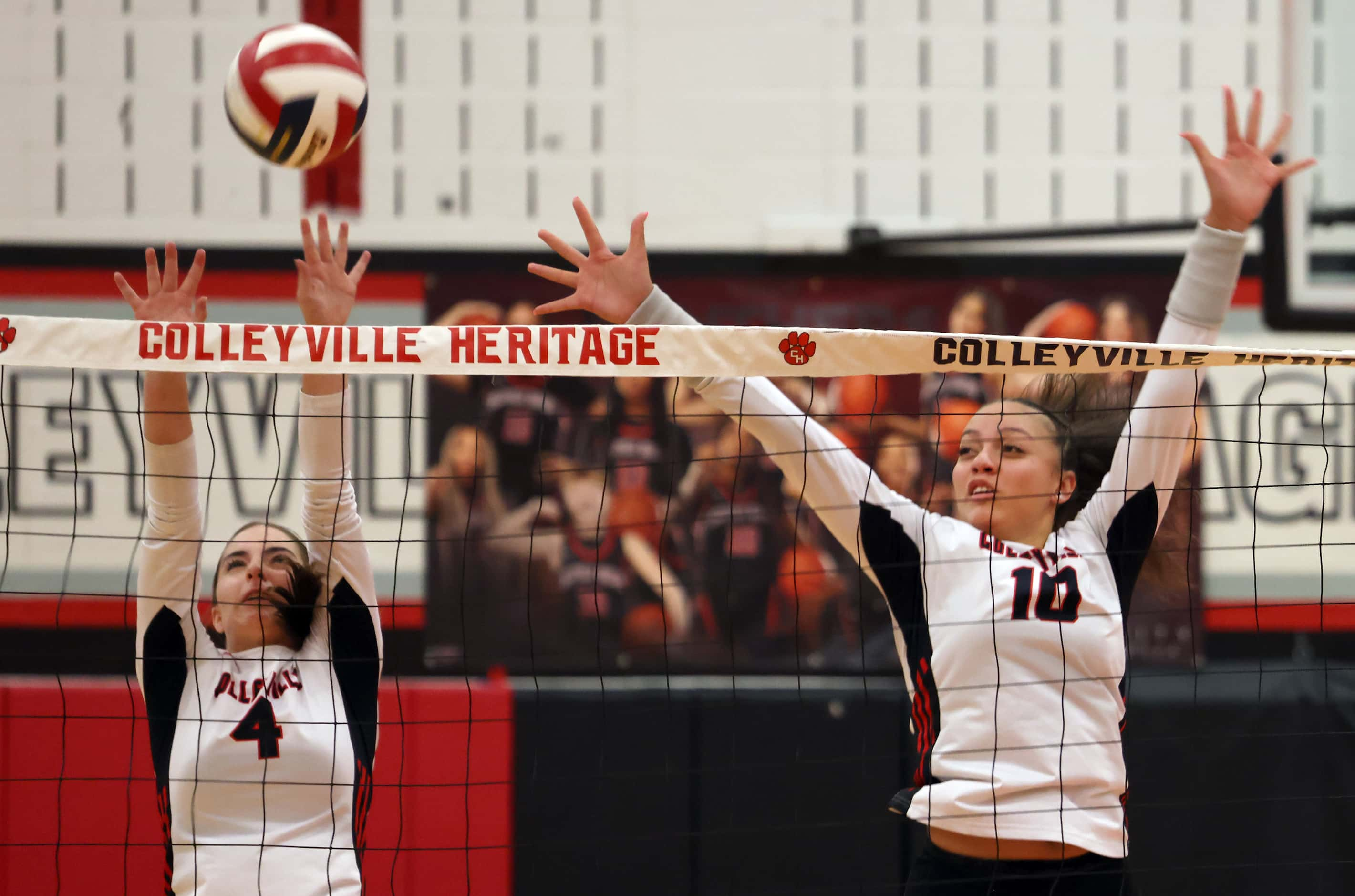 Colleyville Heritage Panthers Georgia Smith (4), left, and Onita Davis (10) make their...