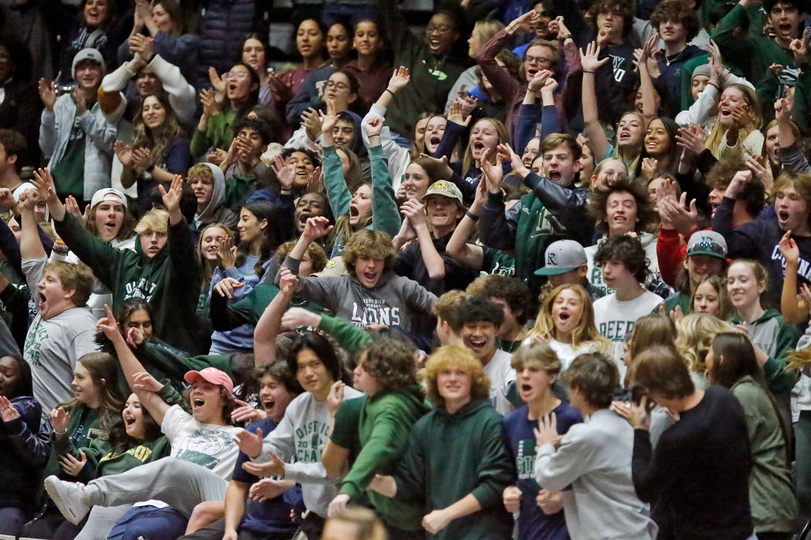 The Reedy High School student section reacts to winning game two as Colleyville Heritage...