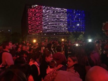  A group of about 200 gathered outside the Omni Hotel in downtown Dallas on Sunday night in...