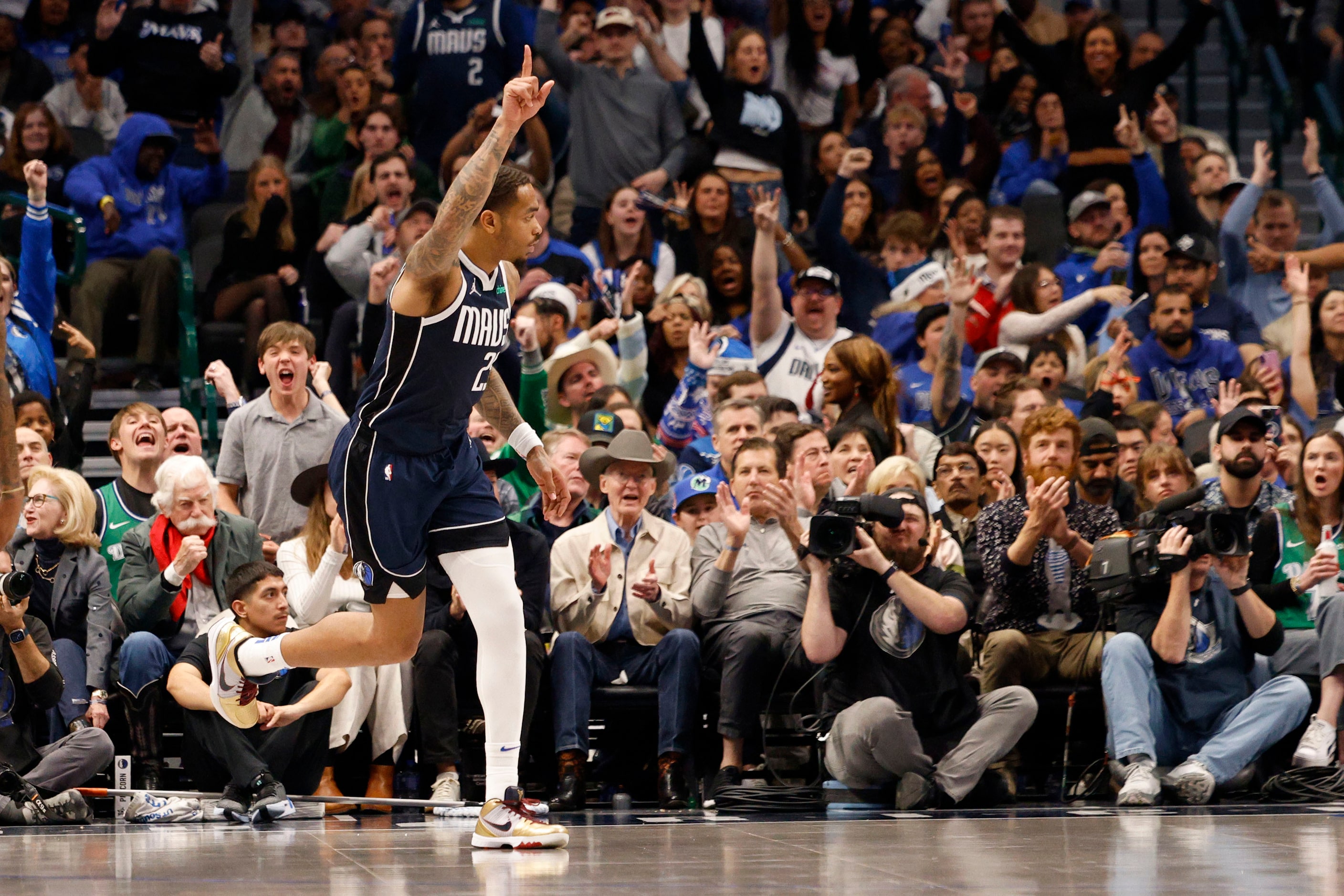 Dallas Mavericks forward P.J. Washington (25) gestures after he scores against LA Clippers...