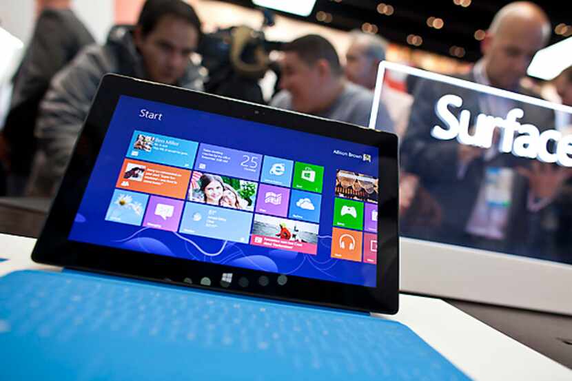 A Microsoft Surface tablet sits on display during Thursday's grand opening of the company's...