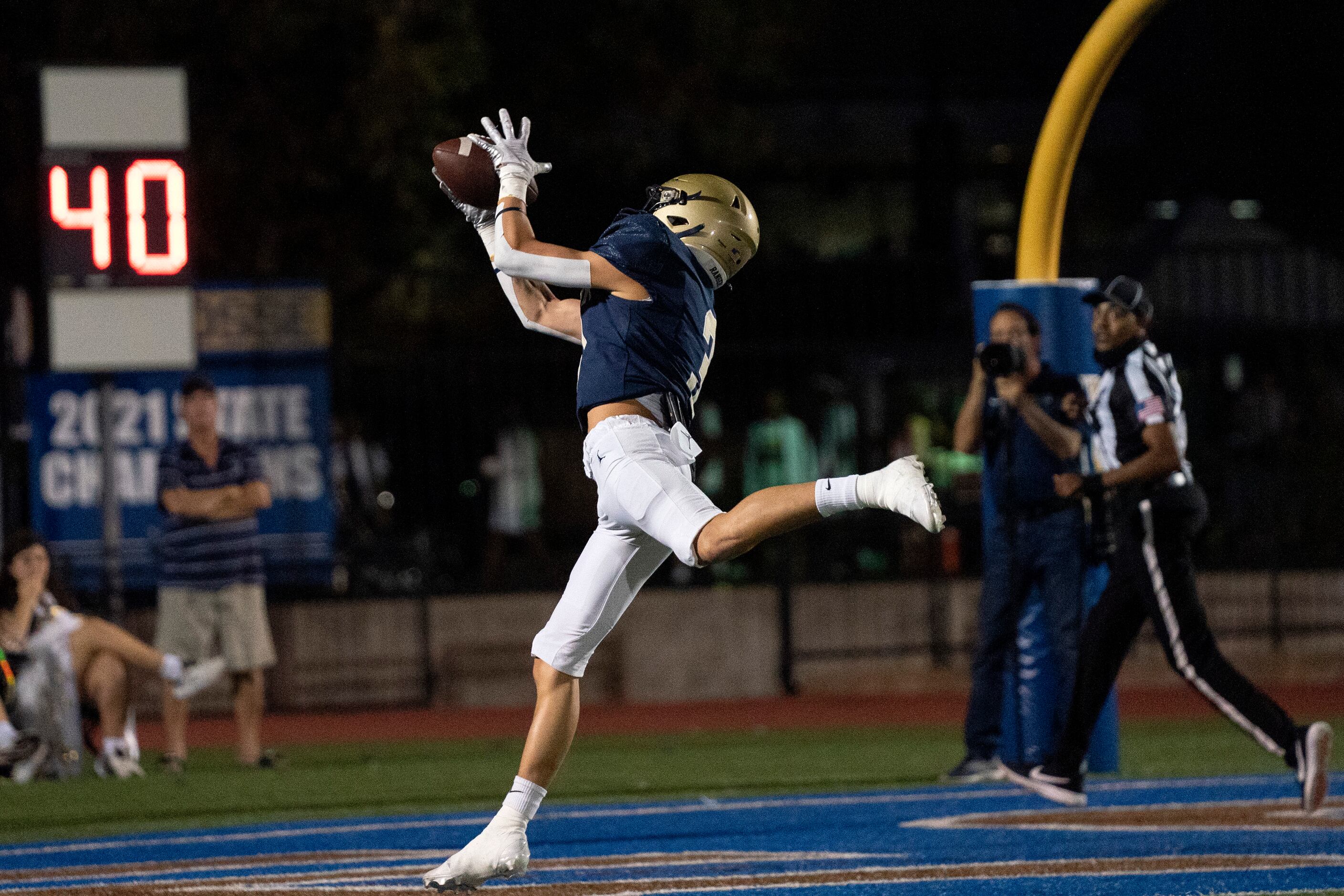 Jesuit senior wide receiver Truett Whitley (3) hauls in a touchdown pass during the first...