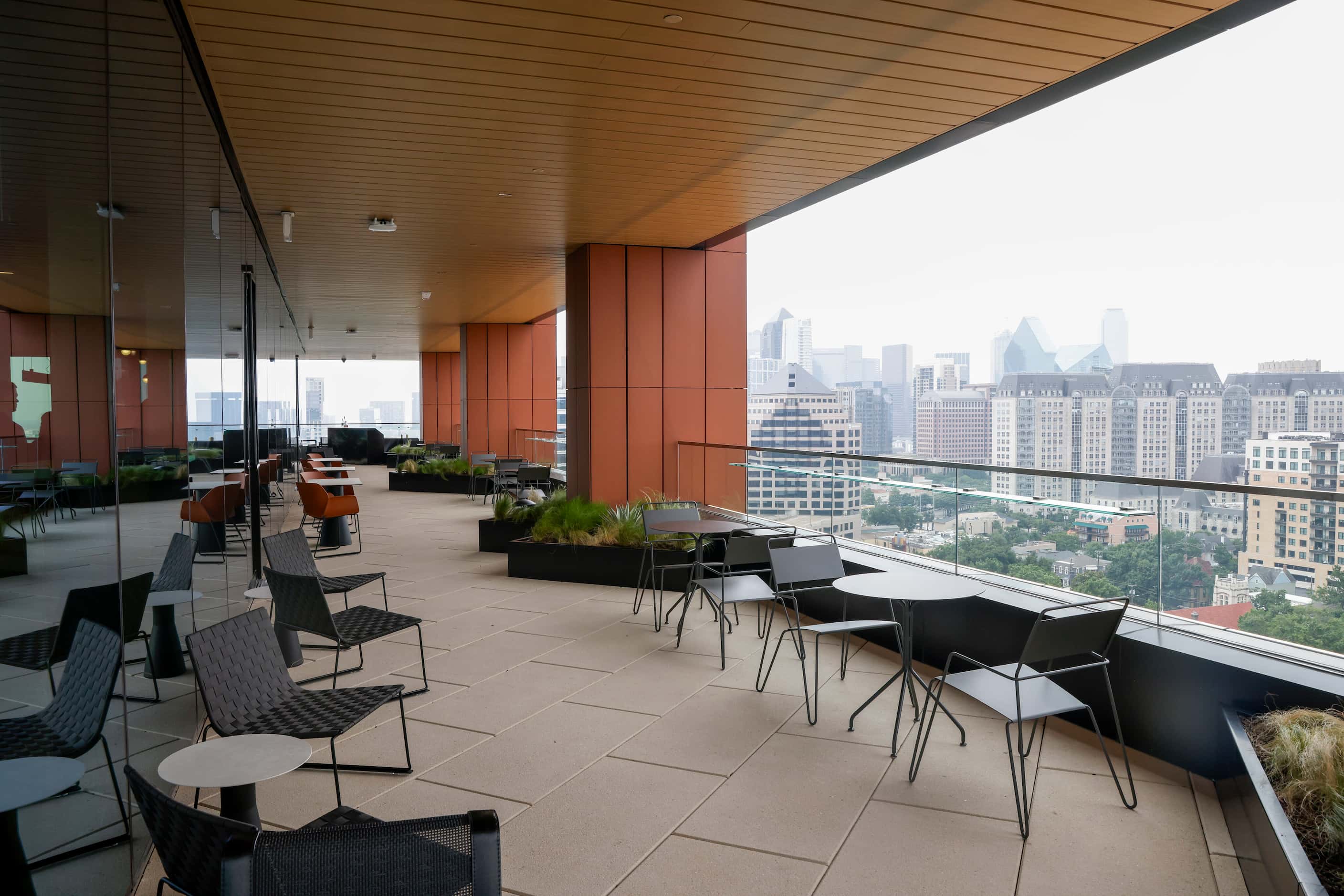 The amenity level also houses a covered terrace with views of the Dallas skyline.