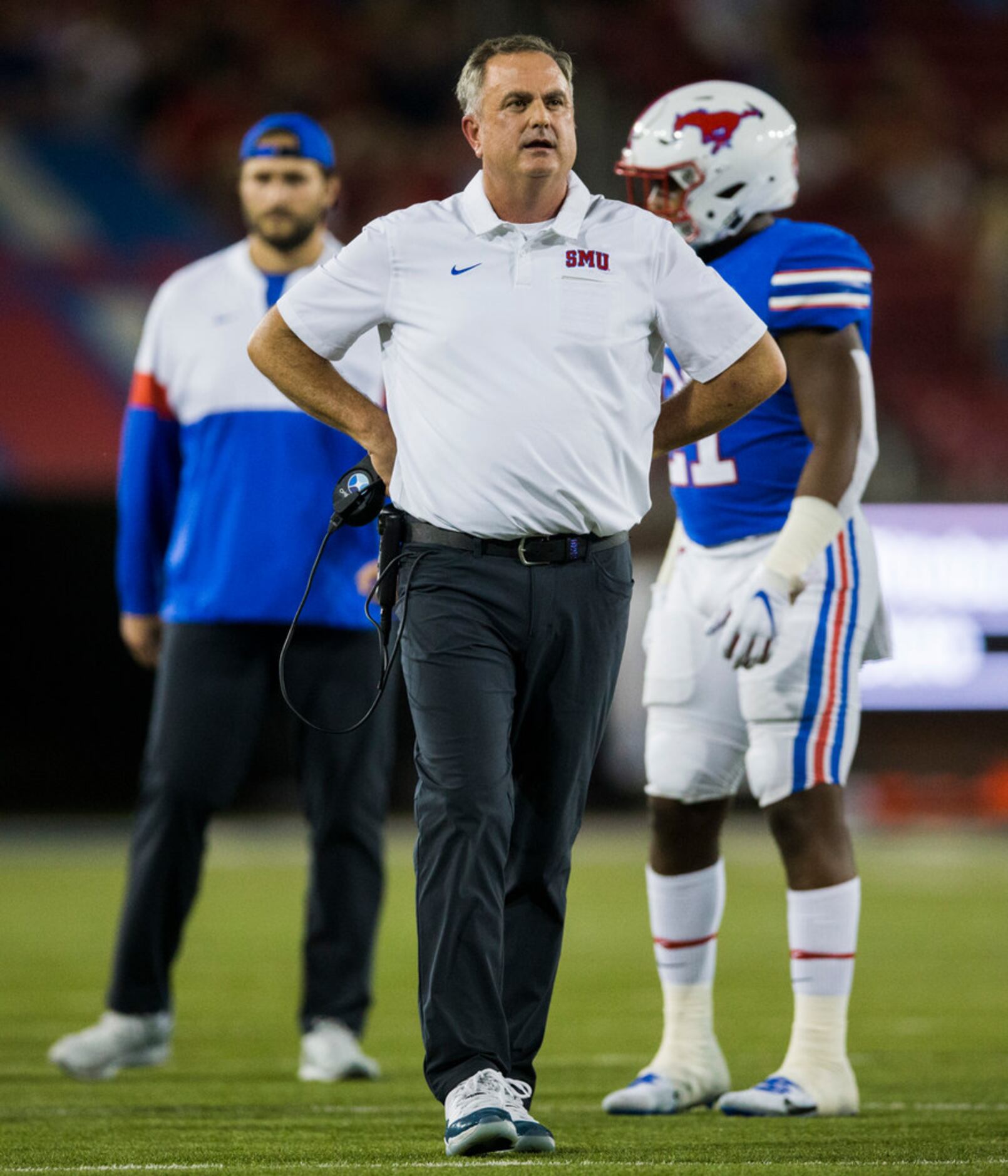 SMU Mustangs head coach Sonny Dykes looks up at the video board during the fourth quarter of...