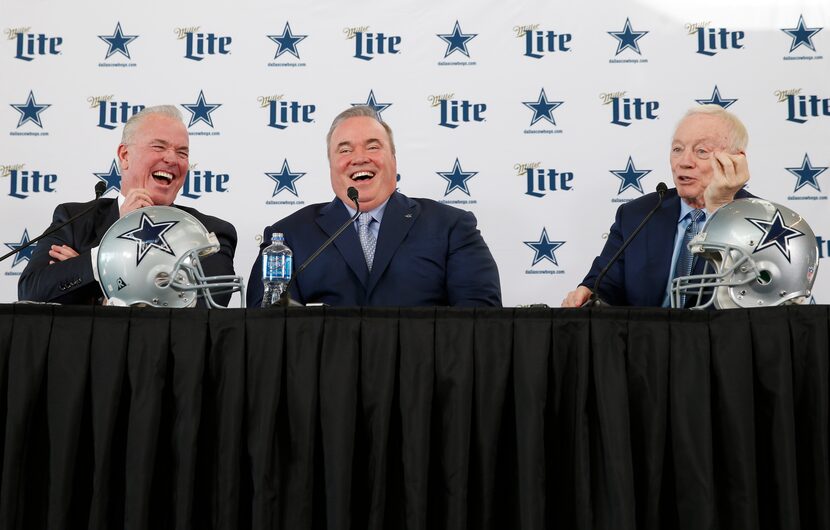 Dallas Cowboys new head coach Mike McCarthy (center) shares a laugh with Dallas Cowboys...