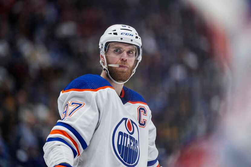 Edmonton Oilers' Connor McDavid waits to take a faceoff during the second period in Game 7...