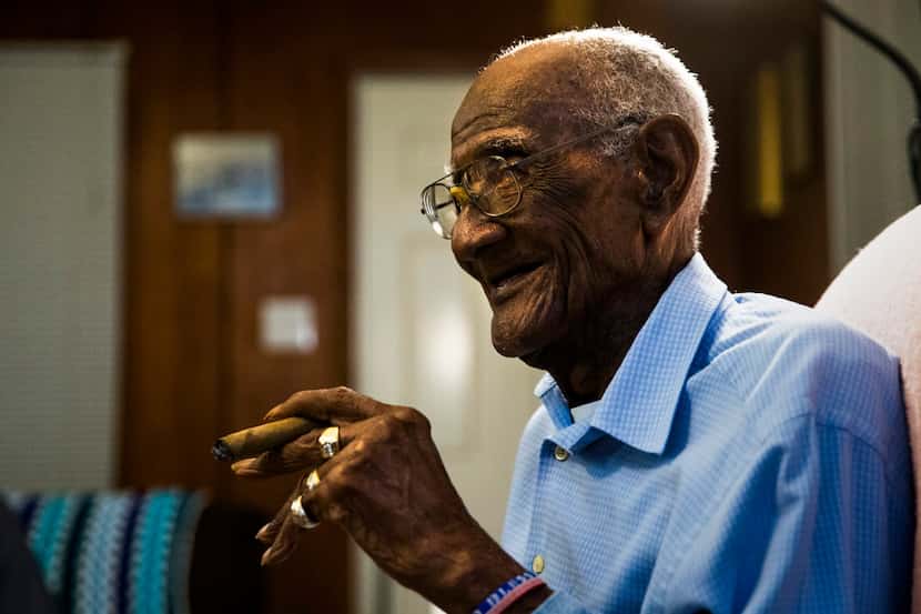 U.S. Army veteran Richard Overton, 111, sits in his chair smoking a cigar at 4:54 a.m. on...