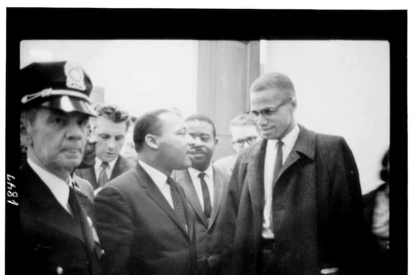 The Rev. Martin Luther King Jr. and Malcolm X meet at the U.S. Senate, on March 26, 1964,...