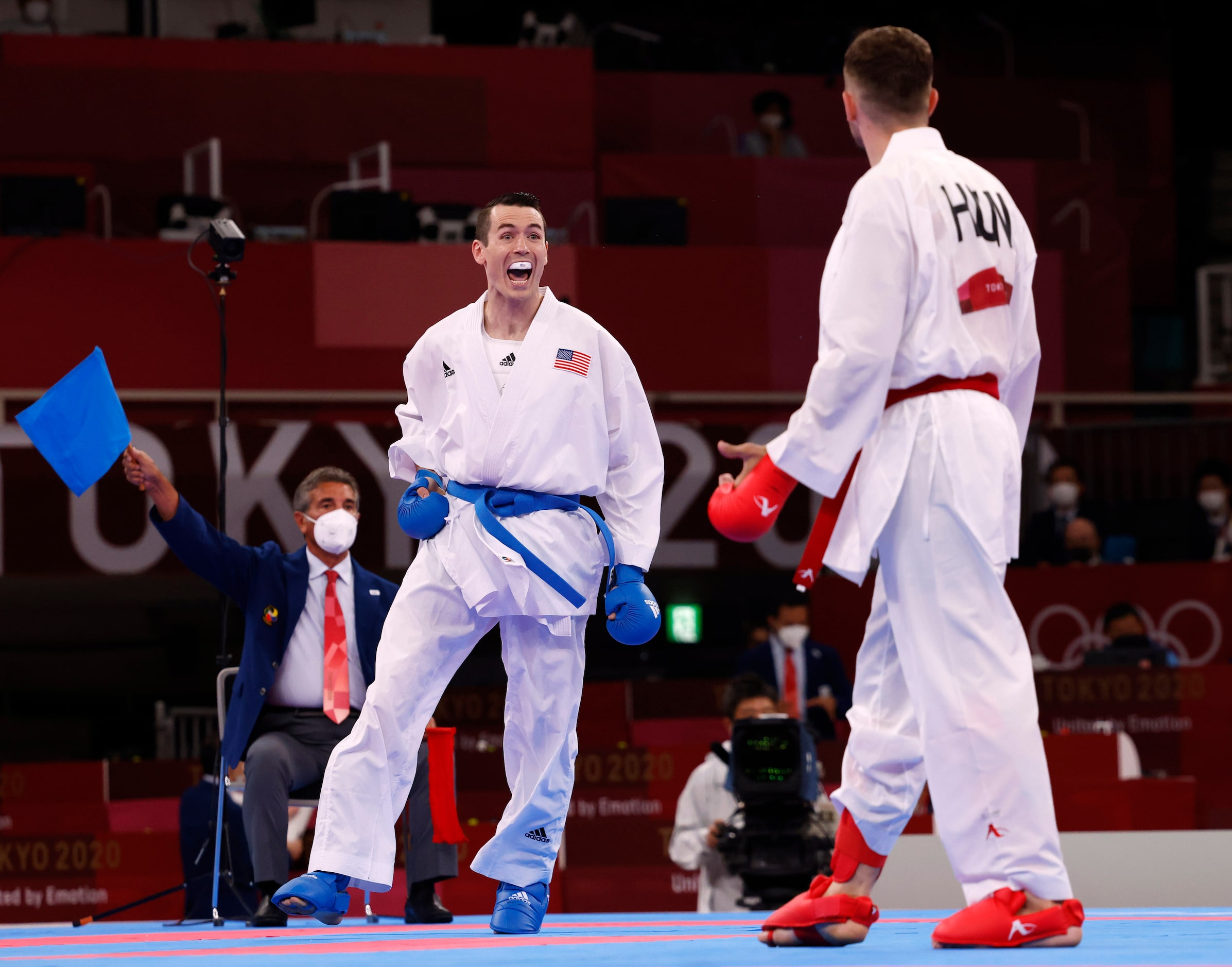 USA’s Tom Scott celebrates after kicking Hungary’s Karoly Gabor Harspataki in the head...