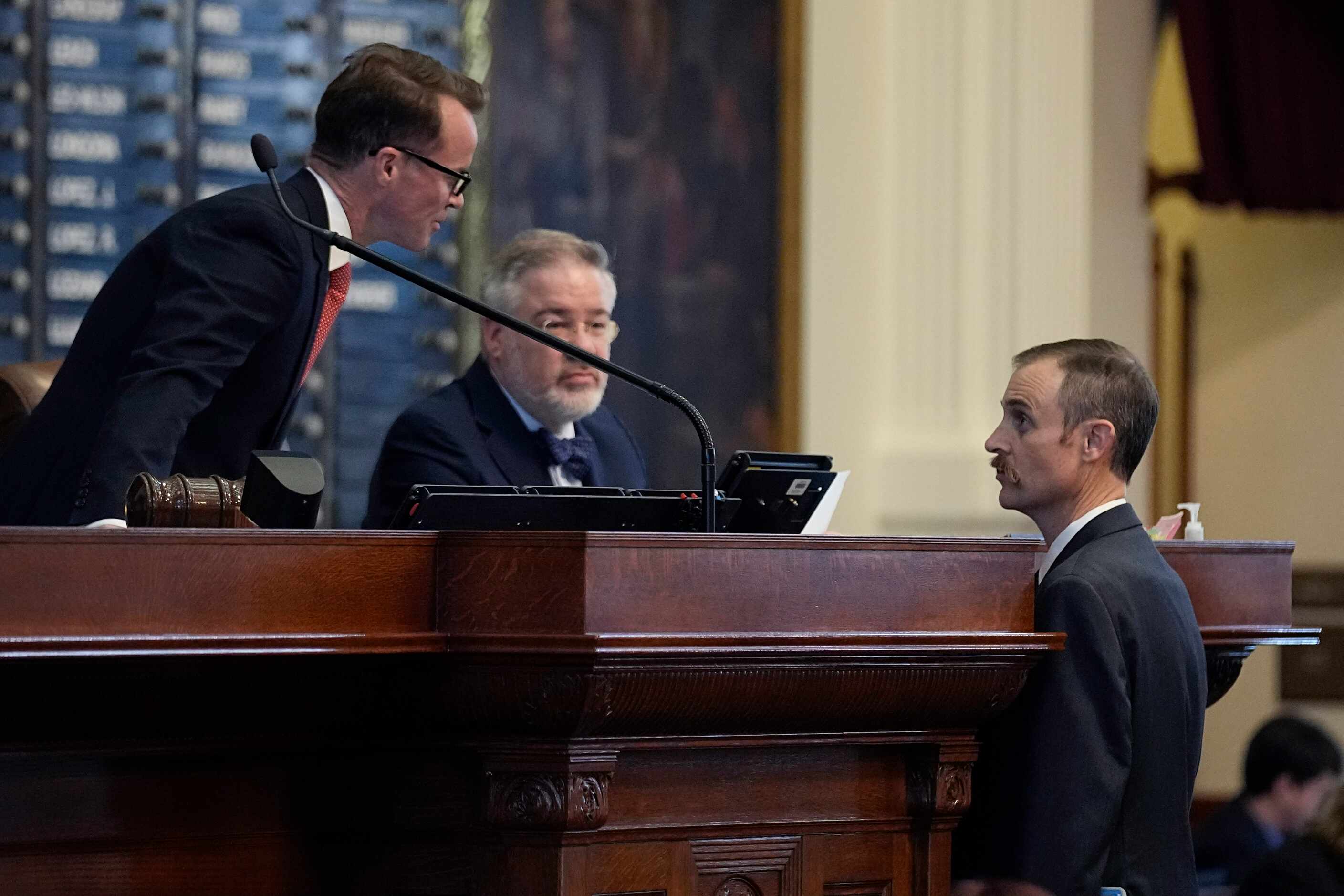 Texas Speaker of the House Dade Phelan, left, speaks with Rep. Andrew Murr, R - Junction,...
