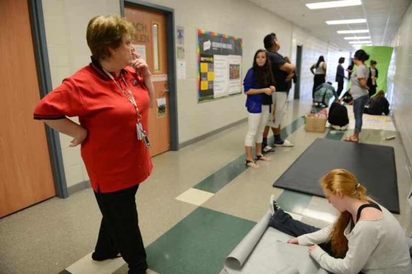 
Reese supervises students during class.
