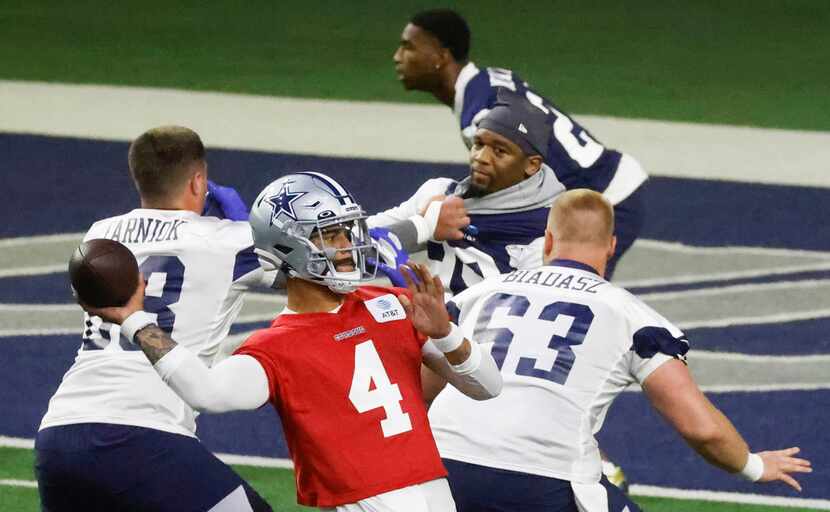 Dallas Cowboys quarterback Dak Prescott (4) throws during Dallas Cowboys OTA practice on...
