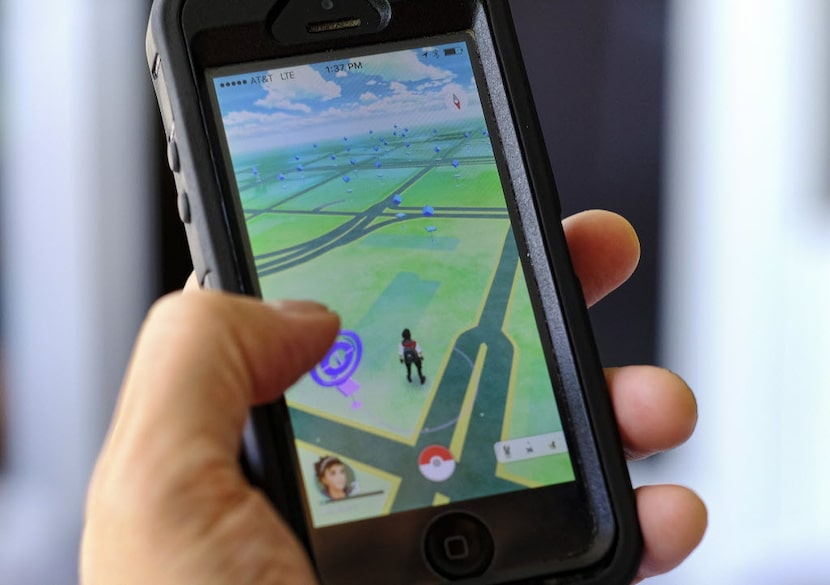 FILE - In this Friday, July 8, 2016, file photo, "Pokemon Go" is displayed on a cell phone...