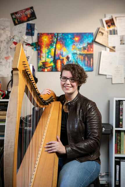 Kimberly Osberg played the harp last year in her Dallas apartment. She moved to Portland,...