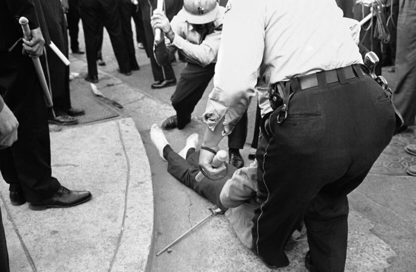From the Associated Press caption that accompanies this archival photo: "Police in Jackson,...