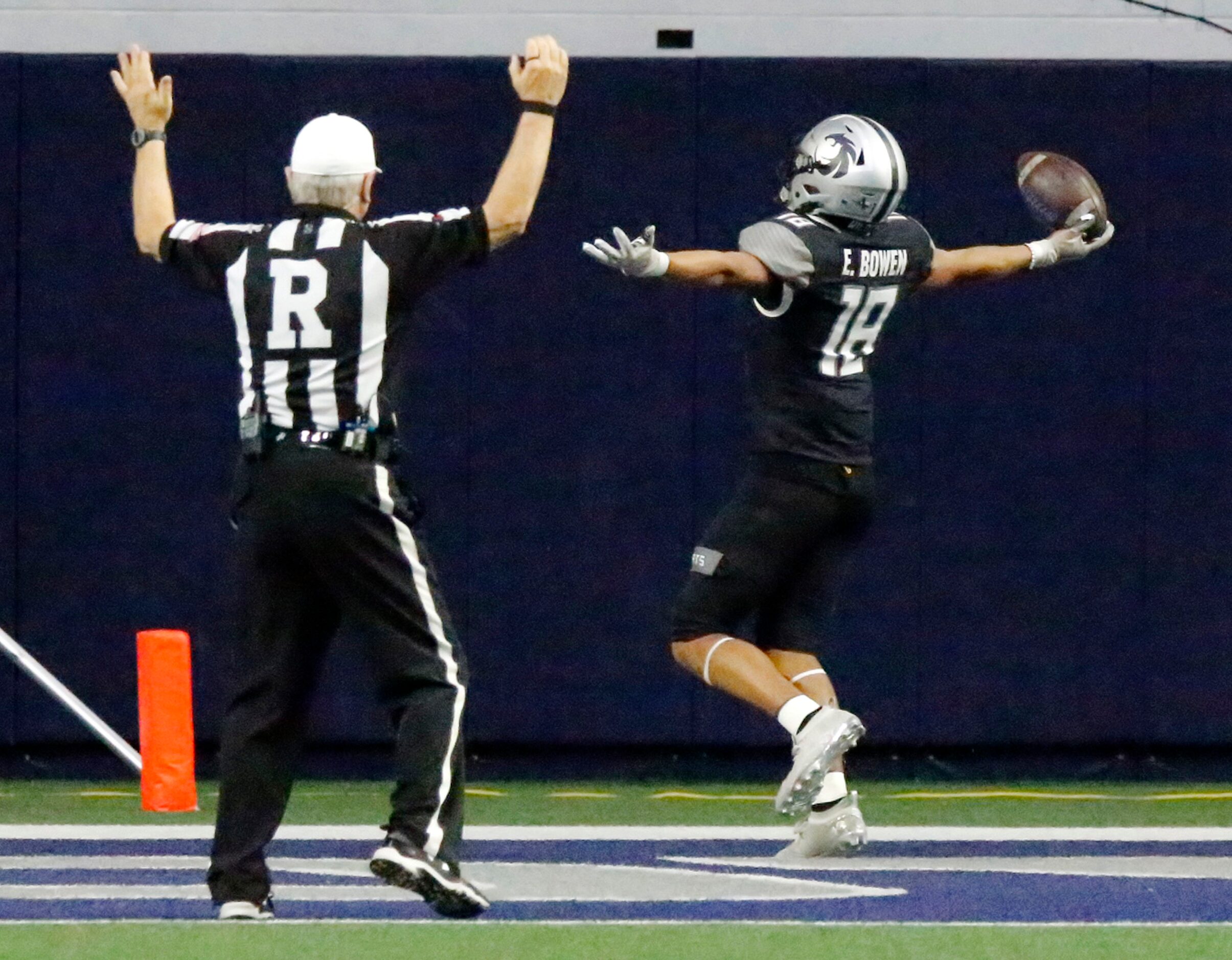 Guyer High School cornerback Eli Bowen (18) returns ban interception for a touchdown during...