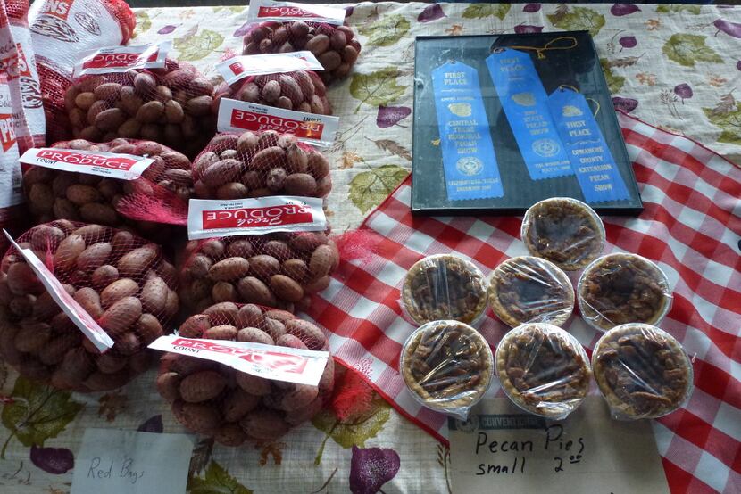 Russell Helge brings his family's pecans, mini pies and blue ribbons from Comanche County to...