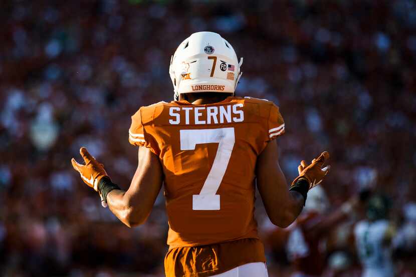 Texas Longhorns defensive back Caden Sterns (7) signals to fans to cheer during the fourth...