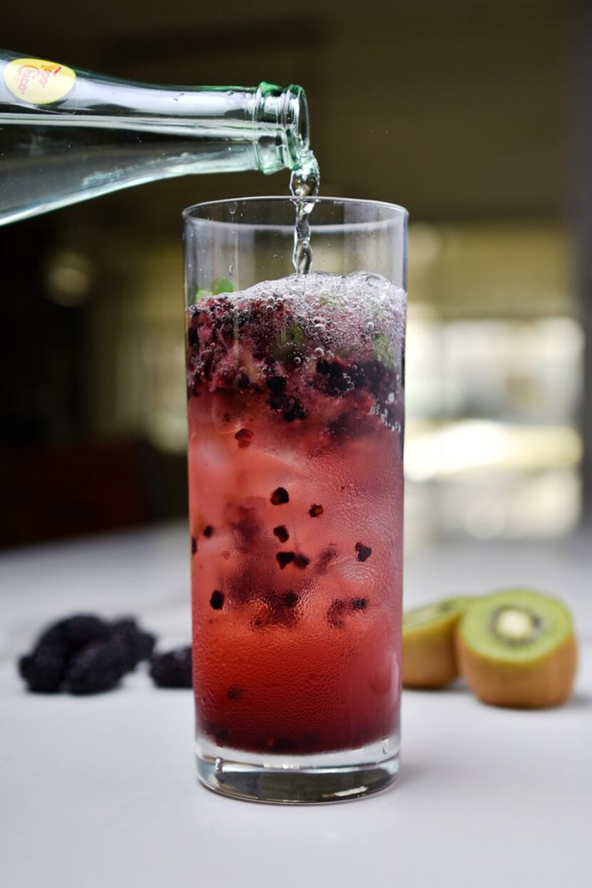 A blackberry kiwi smash mocktail 