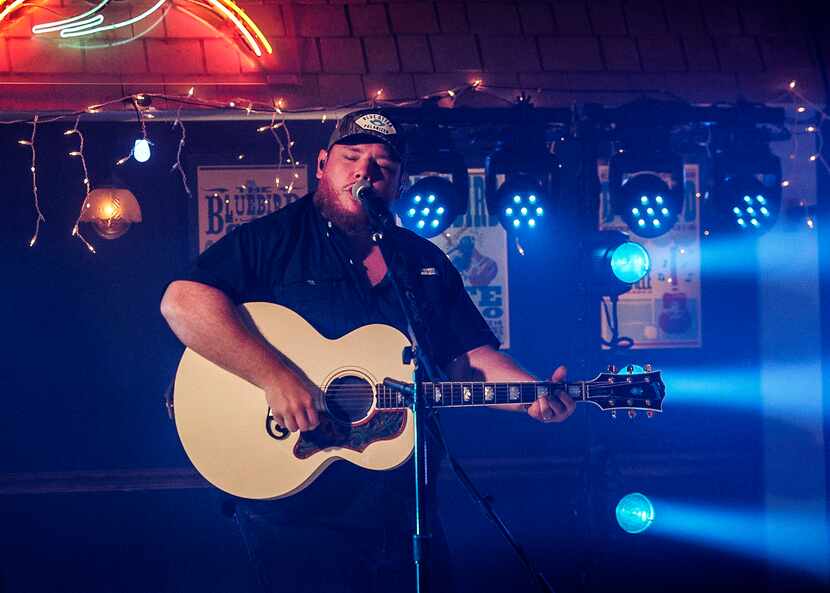 Luke Combs performs at the ACM Awards, where he won album of the year and male artist of the...