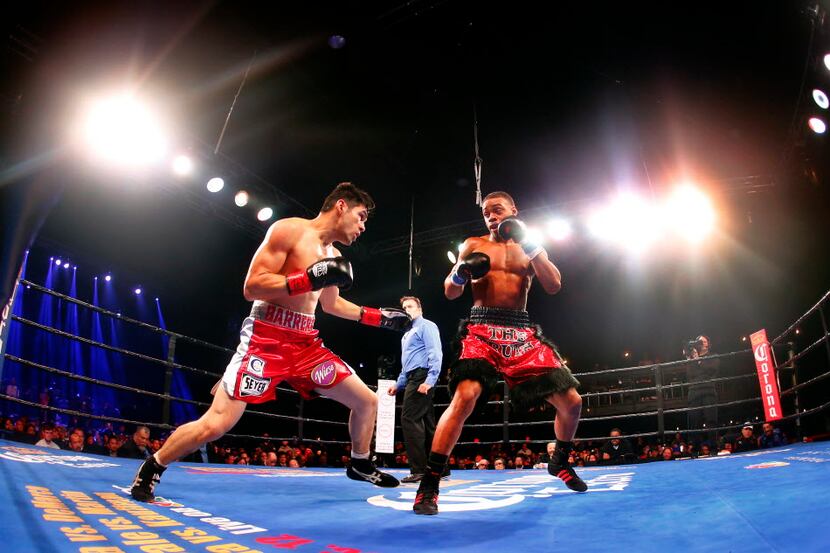 DeSoto boxer Errol Spence Jr (right) and Alejandro Barrera of Mexico battle it out in the...