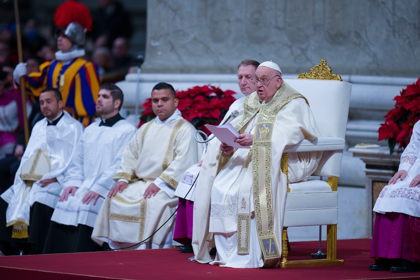 Pope Francis presides over the Christmas Eve Mass in St. Peter's Basilica at The Vatican,...