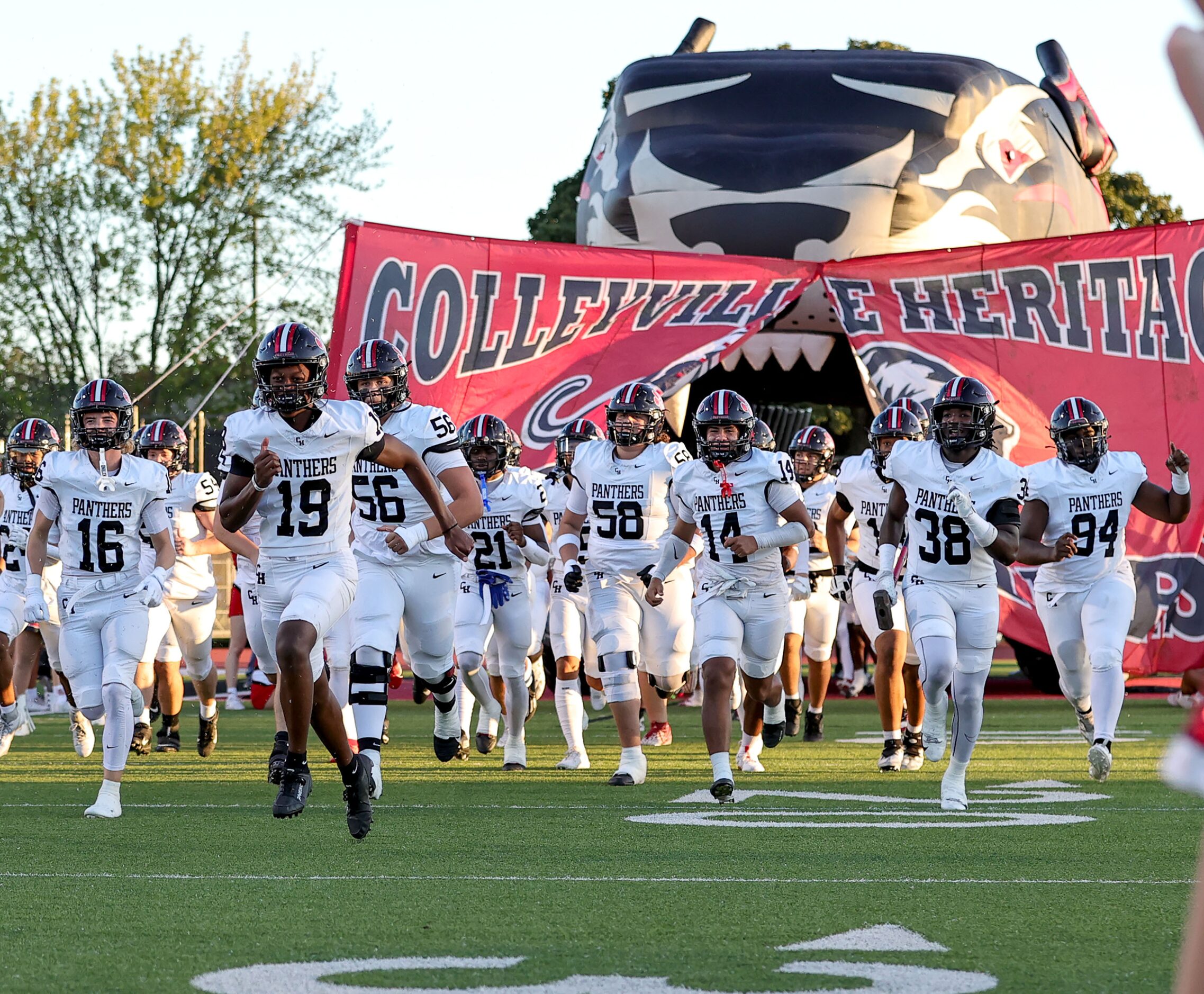 The Colleyville Heritage Panthers enter the field to face Argyle  in a District 3-5A...