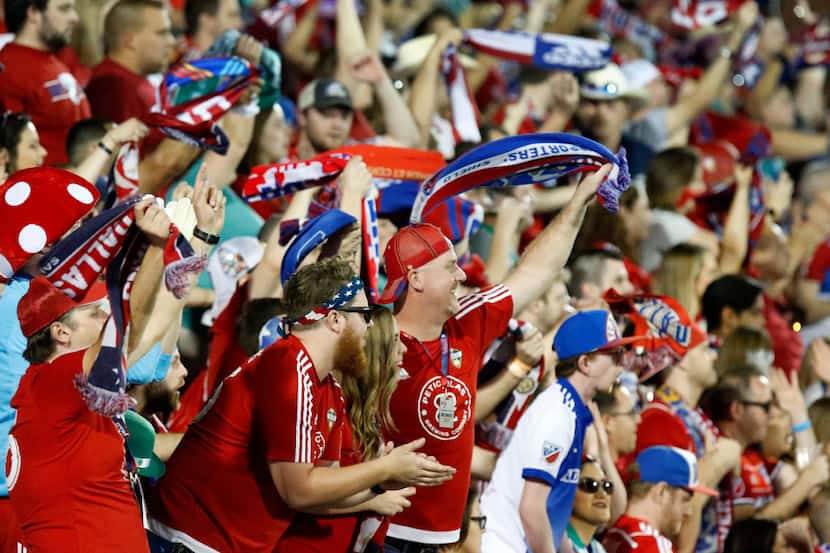 FC Dalls fans celebrate a goal during the second half as FC Dallas hosted the New England...