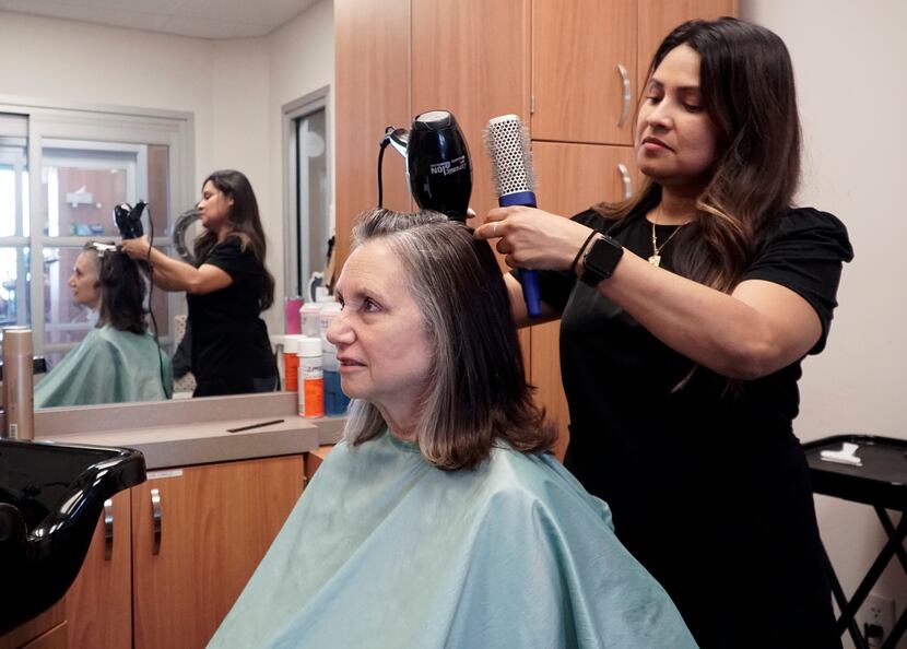 Hairstylist Veronica Vazquez helped Harriet Blake go gray gracefully by adding lowlights to...