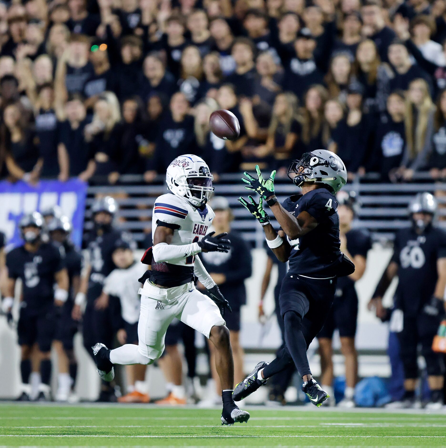 Allen defensive back Jeremiah Dillard (11) catches a long pass in front of Denton Guyer...