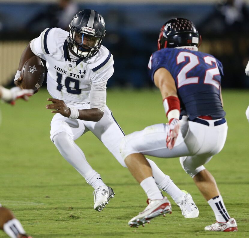 Lone Star's Jason Shelley (18) attempts to shake Centennial's Conner Palmer (22) on a run...