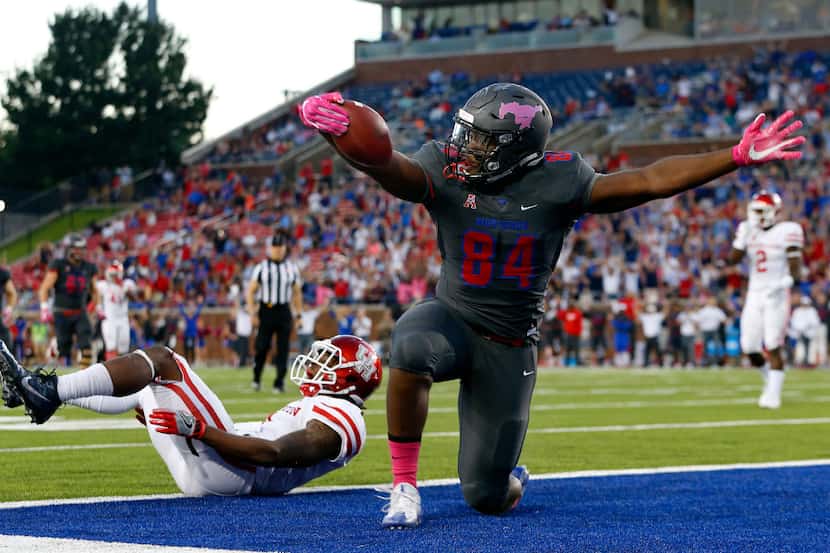Southern Methodist Mustangs tight end Jeremiah Gaines (84) looks for the touchdown call as...