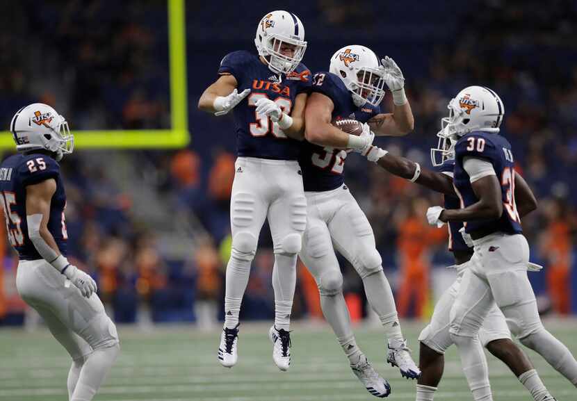 UTSA linebacker Anthony Hickey (32) celebrates his interceptions against Southern with...