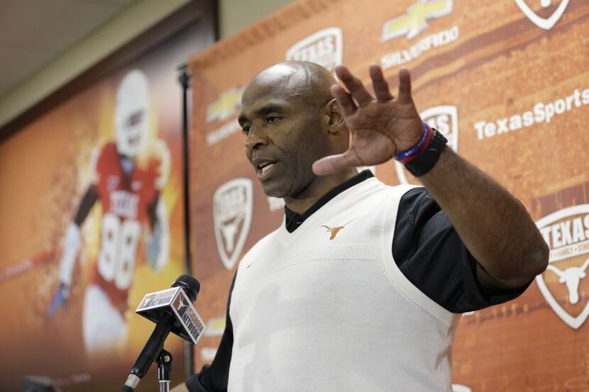 New Texas football coach Charlie Strong talks about his recruiting class during a news...