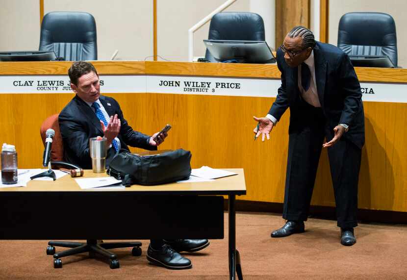 County Judge Clay Jenkins (left) and Commissioner John Wiley Price spar as the Dallas County...