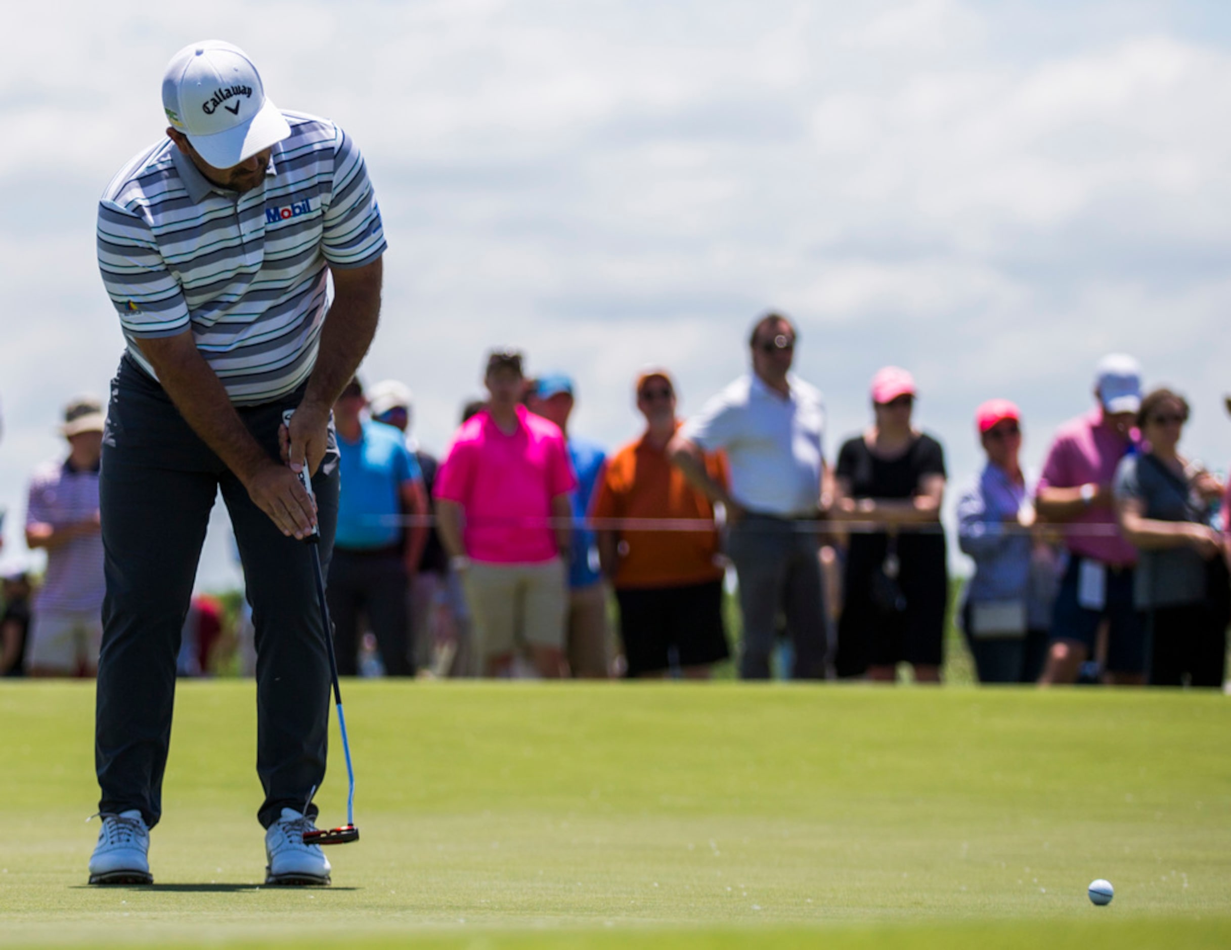 Roberto Diaz putts on the first green during round 4 of the AT&T Byron Nelson golf...