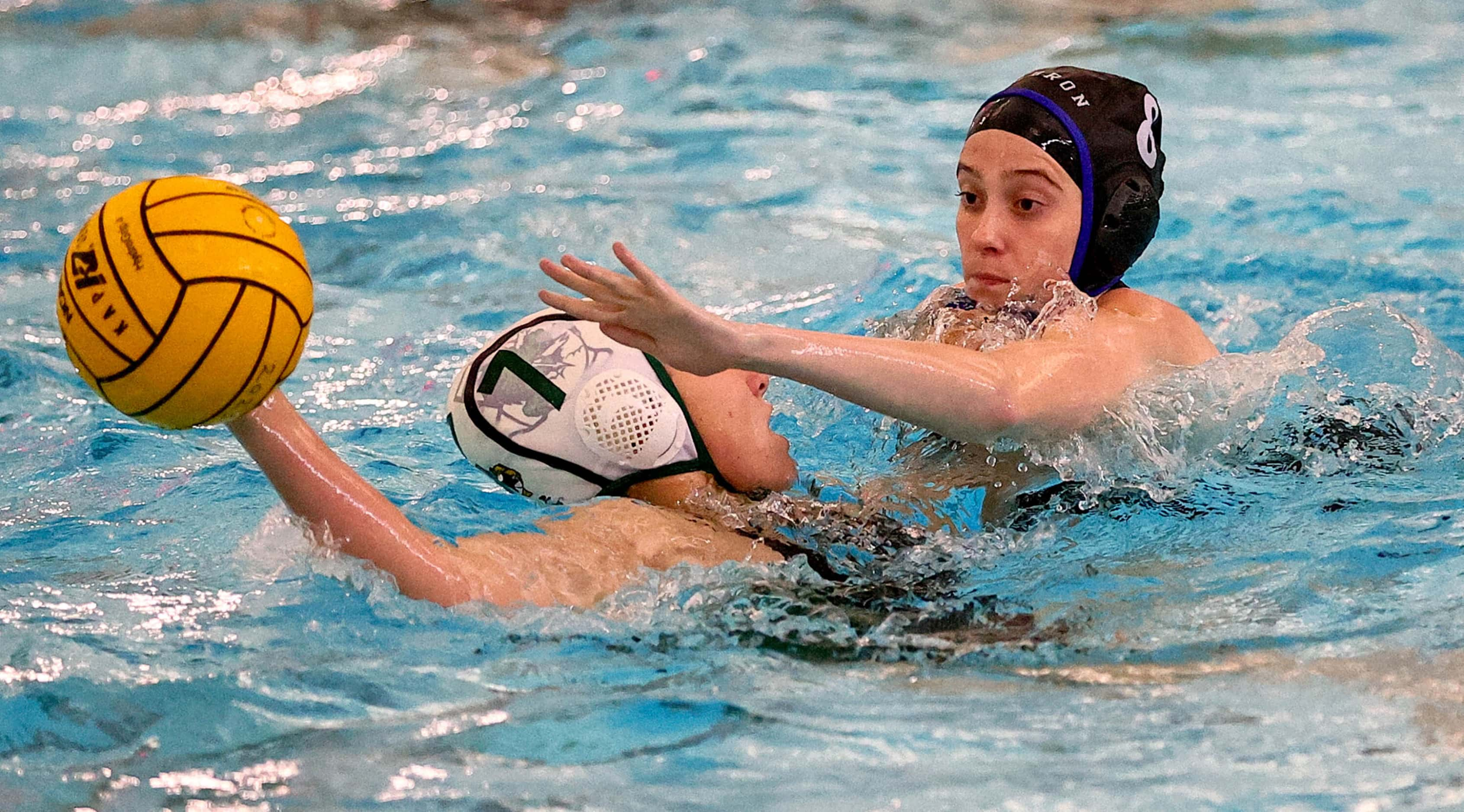 Southlake Carroll's Sydney Rubin (7) tries to get off a pass against Hebron's Avery Gallucci...