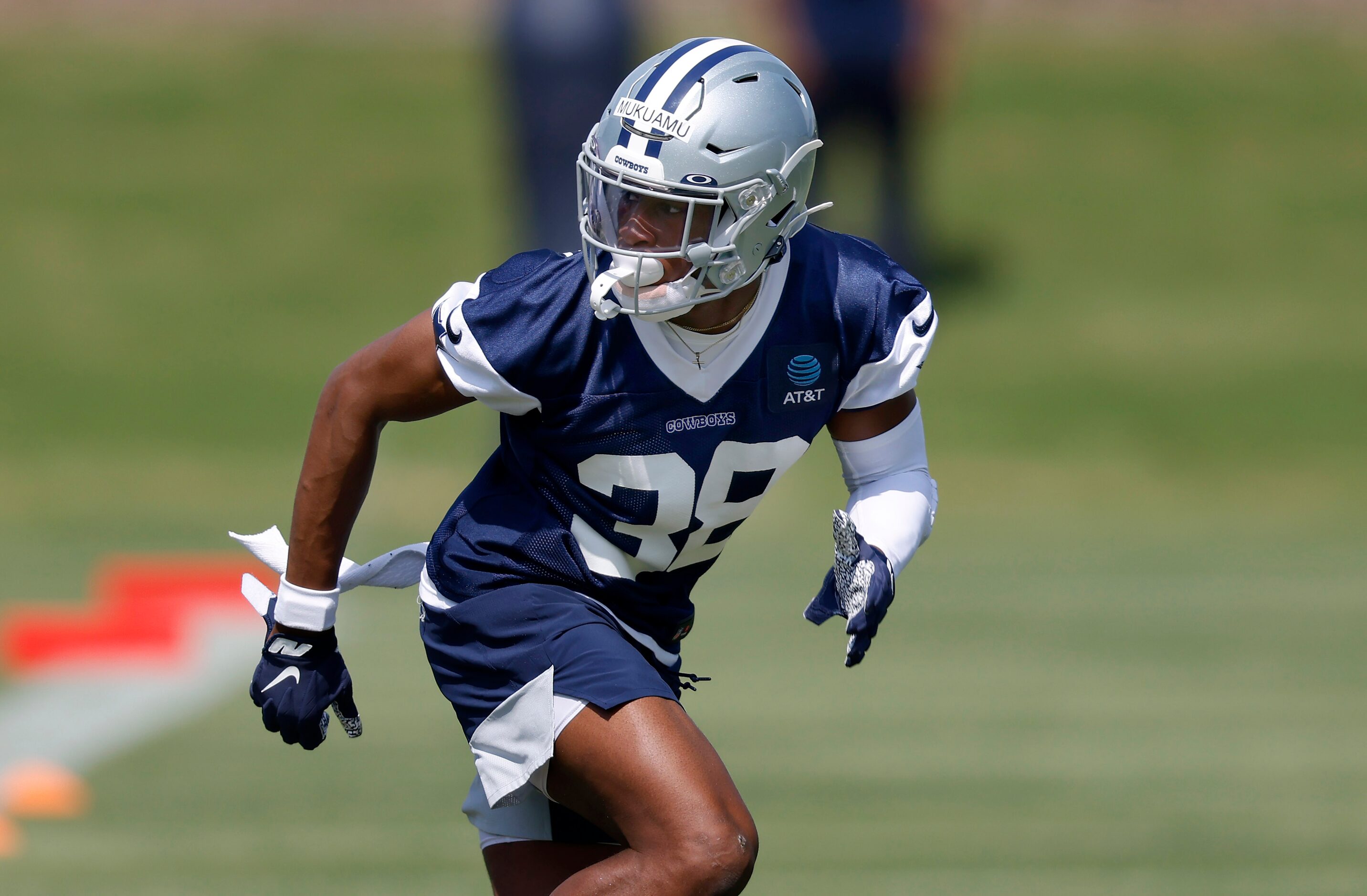 Dallas Cowboys rookie cornerback  Israel Mukuamu (38) runs a cover drill during rookie...