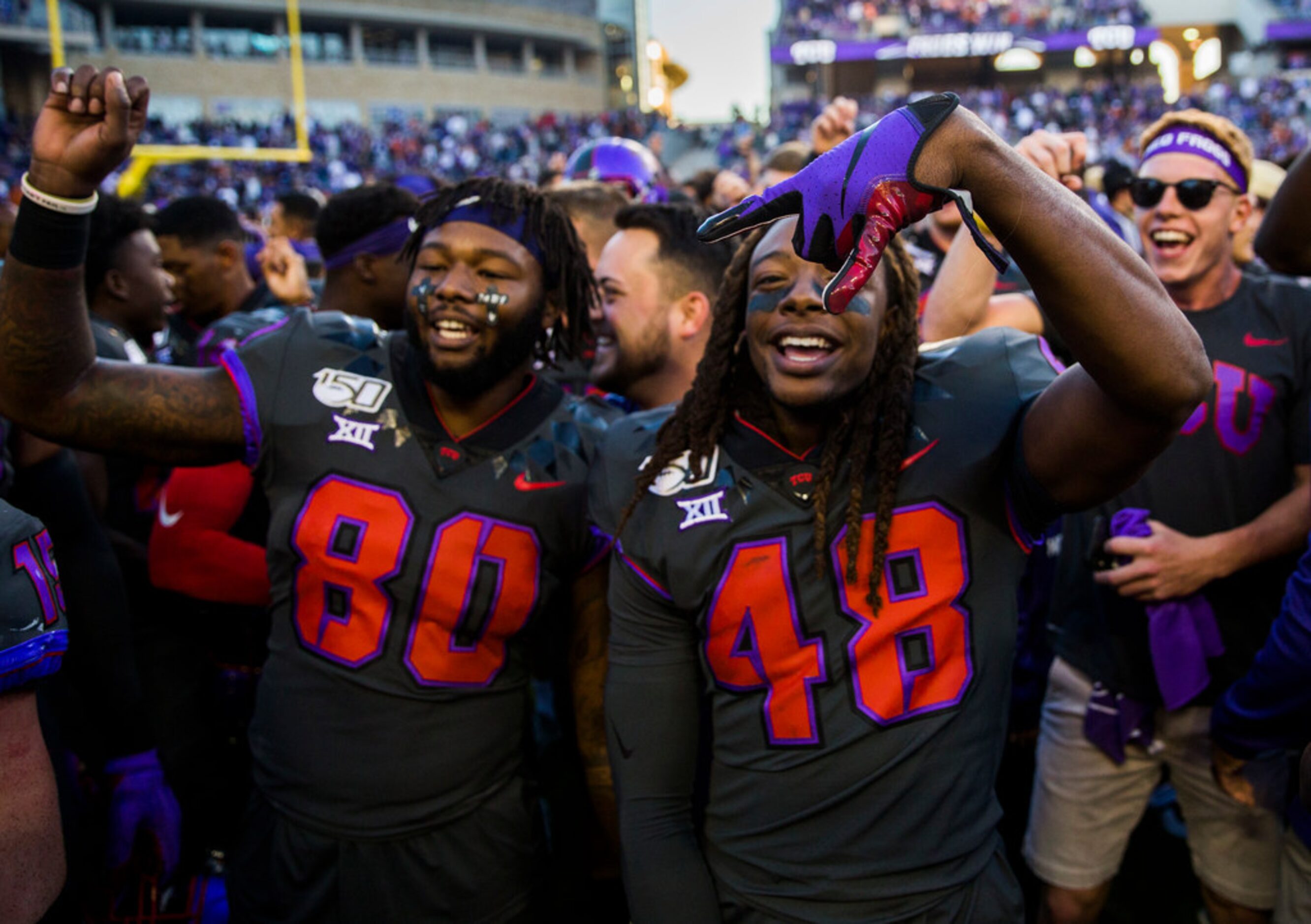 TCU Horned Frogs wide receiver Al'Dontre Davis (80) and cornerback Caleb Biggurs (48)...