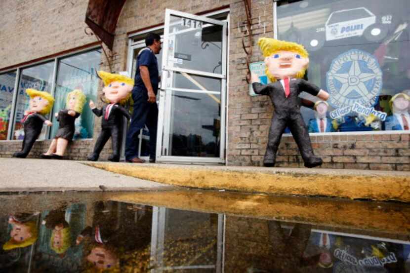 Las piñatas de Donald Trump están en la entrada de ABC Party en Oak Cliff. | BEN TORRES/AL DÍA