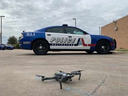 An unmanned aircraft used by Arlington Police in front of an Arlington squad car. The...