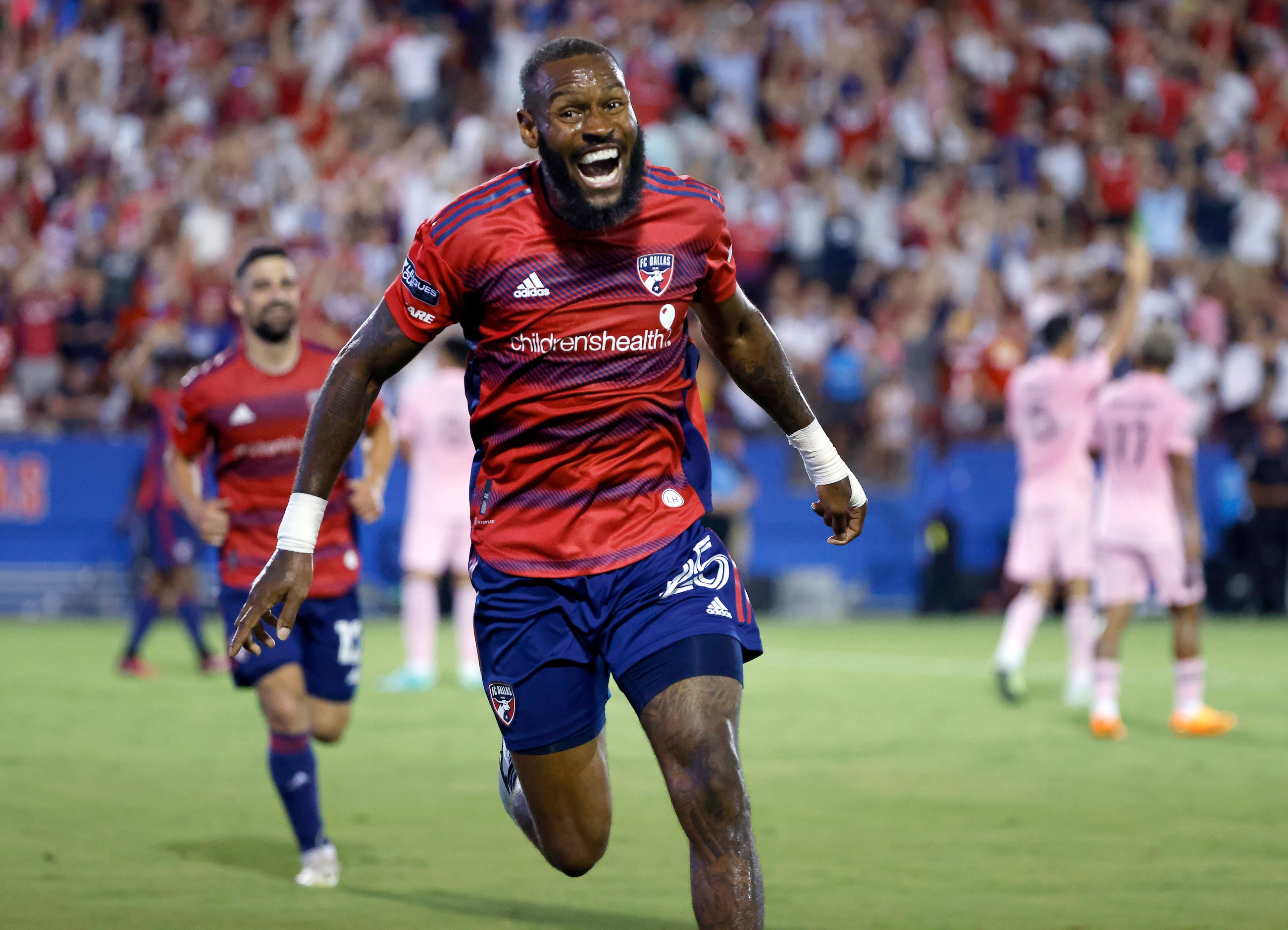 FC Dallas defender Sebastien Ibeagha (25) celebrates his second half goal against the Inter...