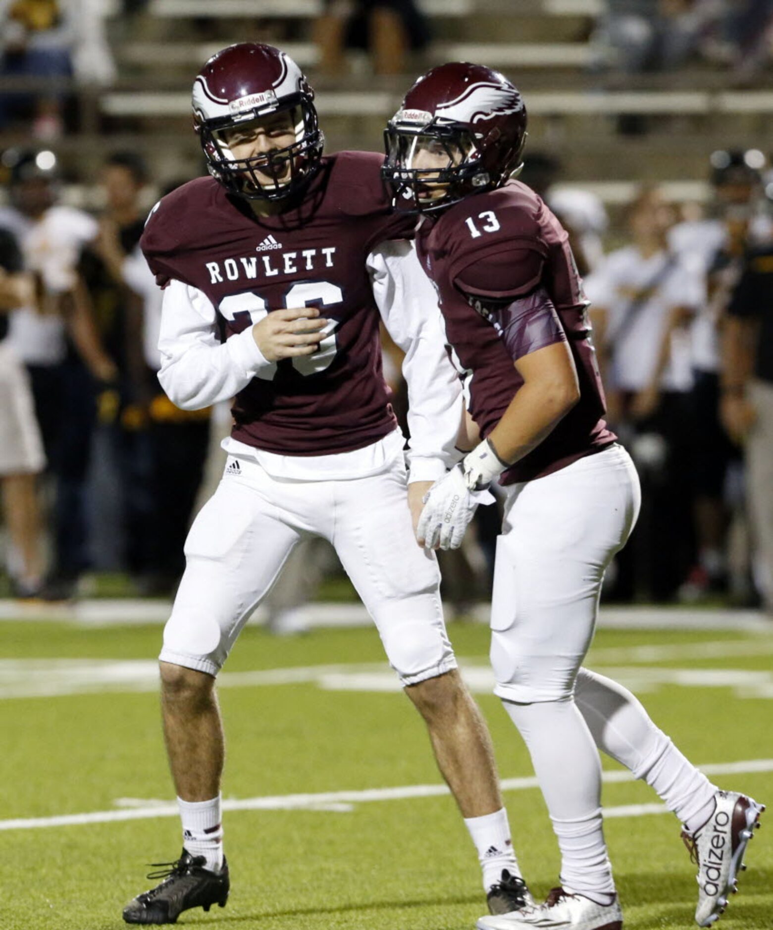 (TXHSFB) Rowlett kicker Chris Luplow (36) and holder Dylan Watts (13) are happy, after...